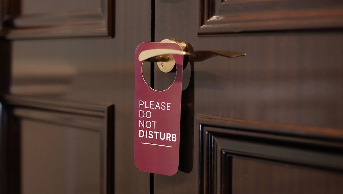 Do Not Disturb Sign on Door Handle