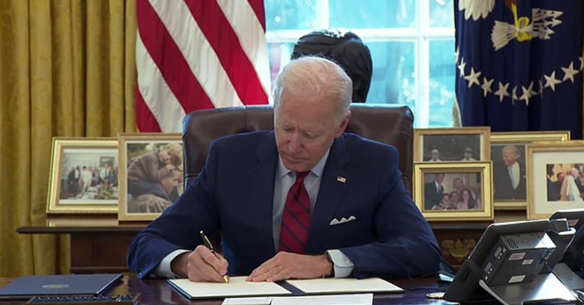 Biden Signing Paper